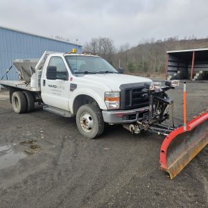 Ford F-350 Super Duty with Snow Plow and Salt Spreader